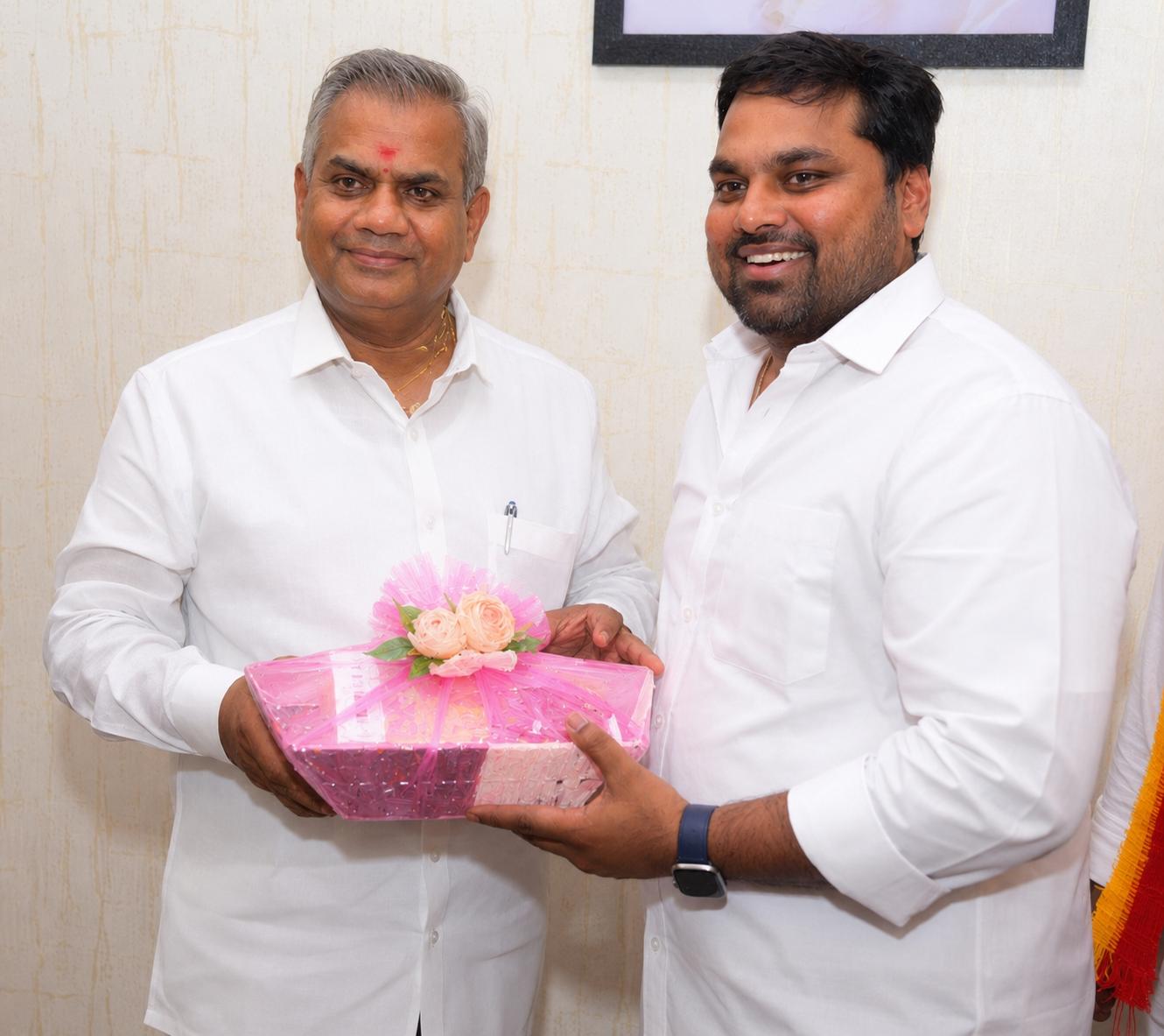 With Minister Bussy Anand